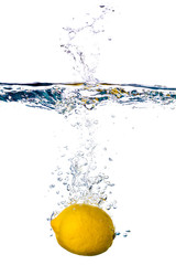 Lemon splashing into water isolated on white