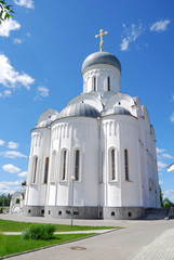 White stone church against the blue sky