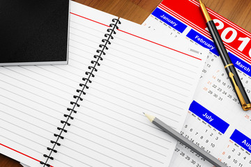 notebook for notes on the table