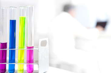 senior male researcher carrying out scientific research in a lab