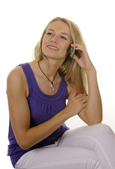 Fototapeta premium Junge Frau mit Handy