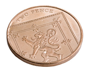 A UK copper two pence coin isolated on white