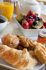breakfast treat with fruit and pastries