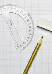 A pencil, an eraser and a ruler