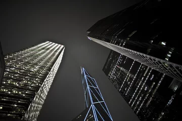 Foto op Plexiglas facade of skyscrapers  by night © travelview