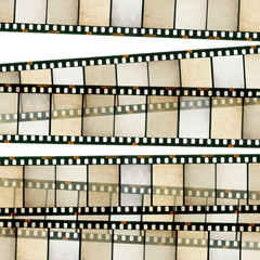 Vintage 35mm film stripes background. Isolated on white.