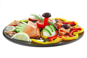 salmon slices on black plate