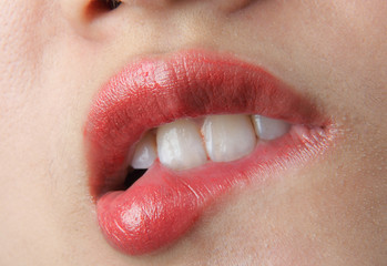 Fototapeta premium Beautiful lips of an attractive woman