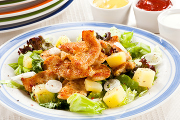 Roasted chicken with vegetable salad