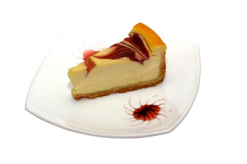 Gourmet slice of cheesecake on the white background