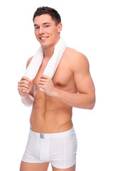 Smiling young man with underwear