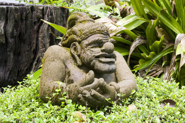 Old mythical statue of a warrior in Thailand