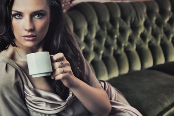 Portrait of a beautiful lady drinking afternoon coffee