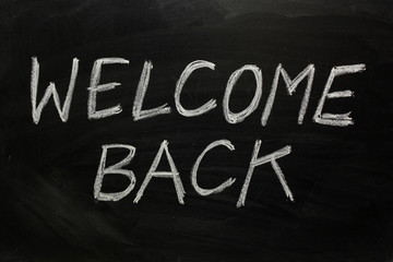 Welcome Back written on a Blackboard