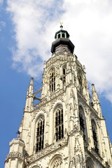 Breda Cathedral tower against a blue sky