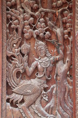 art carving on window of Wat Kwan Muang, Borabue, Mahasarakam