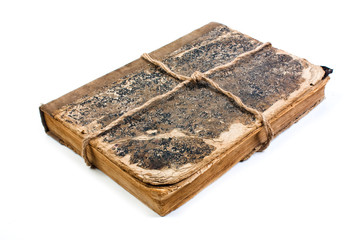 An old book with a crumpled sheet