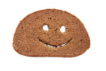 Slice of bread with a smiling face isolated on white background