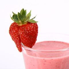 Strawberry shake in a glass decorated with a strawberry