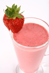Strawberry shake in a glass decorated with a strawberry