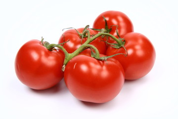 Bunch of tomatoes on white background