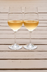 Two Glasses of White Wine on the Deck