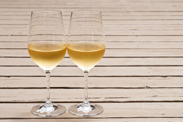 Two Glasses of White Wine on the Deck