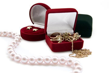 Jewelry in boxes on a white background