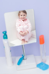 Little girl in a mirror