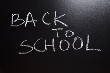 Obraz premium Inscription on a school chalkboard - back to school