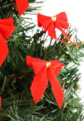 Christmas tree decorated with red bows
