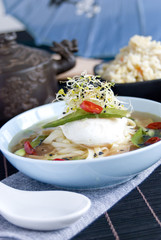 Chinese broth with poached egg