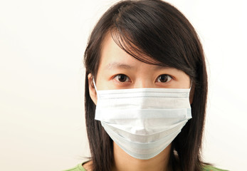 attractive young lady with a face mask