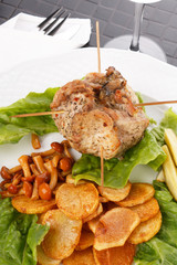 meat with with mushrooms and potatoes