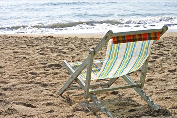 Fototapeta na wymiar Tropical Beach Chairs on Sand