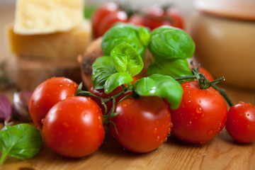 Close-up of fresh cherry tomatoes and basil