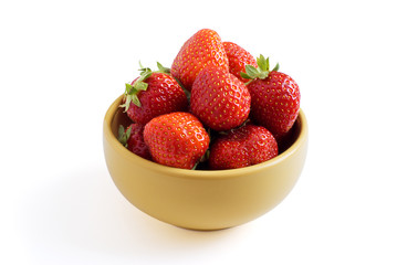 Strawberry is on the yellow plate