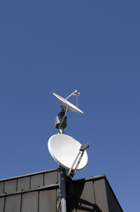 Satellite dishes on rooftop