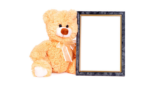 Beige toy teddy bear with frame for baby photography
