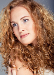 Portrait of beautiful lady on blue