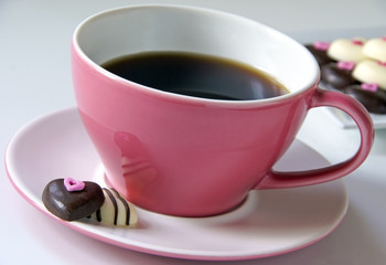 Coffee with chocolate hearts