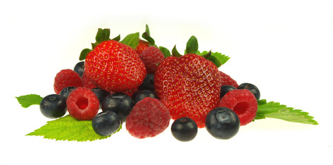Raspberries,strawberries and blueberries on white background