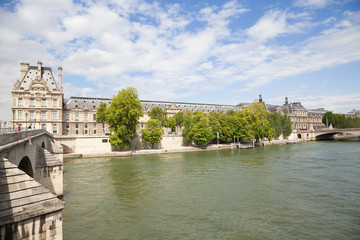 Louvre museum. South facade behind Seine river. Paris, France