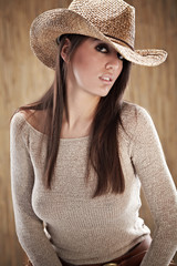 sexy woman with cowboy hat - obrazy, fototapety, plakaty