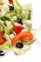 Roasted chicken legs with salad