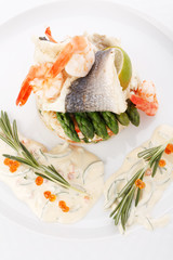 prepared fish with rice and vegetables