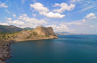 Sea, mountains and blue sky