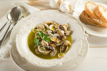 clam soup on dish - zuppa di vongole