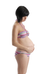 femme enceinte en bikini sur fond blanc © aldegonde le compte