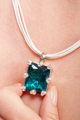 Necklace with blue gem